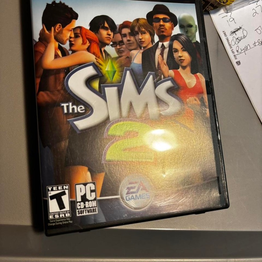 Sims Pc Games Set 1 Some Scratching On Cd An Set 2 Has 3 CDs No Defects